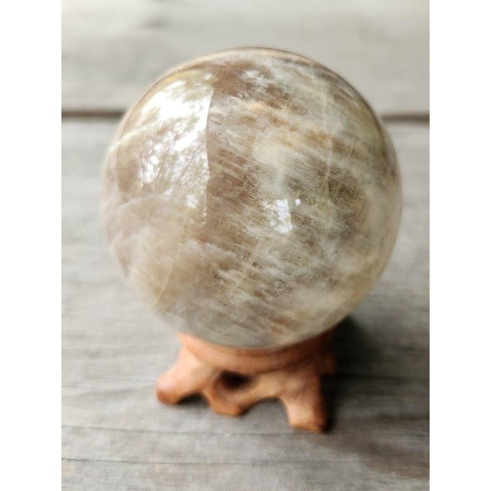 Large Peach Moonstone Sphere with Carved Wooden Stand,